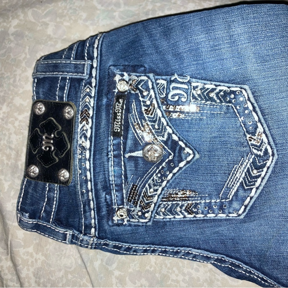 Selling these Miss Me jeans. Never worn. Size 27 Women’s, Bootcut & Lowrise.